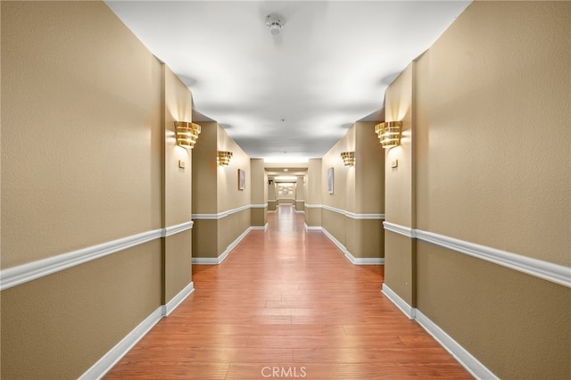 35 Linden Unit 302, Long Beach, CA 90802 - hall featuring hardwood / wood-style flooring, baseboards, and a textured wall