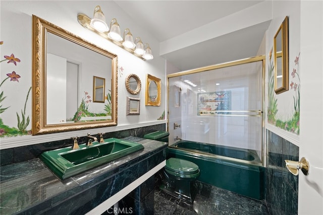 35 Linden Unit 302, Long Beach, CA 90802 - full bath with toilet, bath / shower combo with glass door, vanity, and tile walls