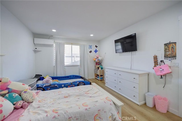 4210 Sirius Ave, Lompoc, CA 93436 - bedroom featuring light wood finished floors, a wall mounted AC, and recessed lighting