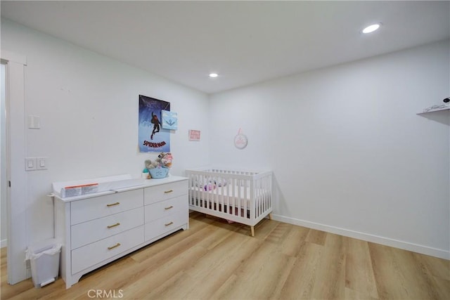 4210 Sirius Ave, Lompoc, CA 93436 - bedroom with a nursery area, baseboards, light wood finished floors, and recessed lighting