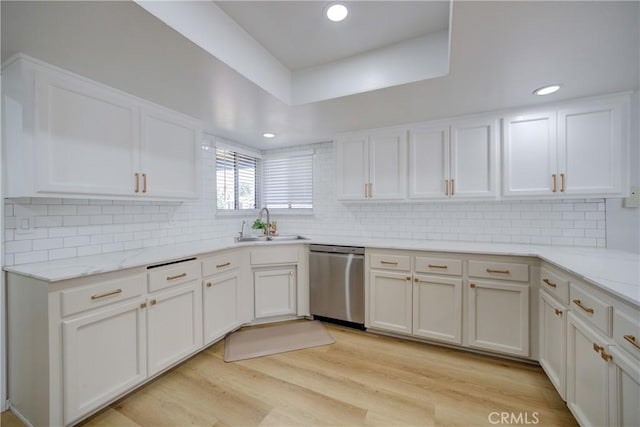 4210 Sirius Ave, Lompoc, CA 93436 - kitchen featuring light wood finished floors, dishwasher, white cabinetry, and a sink