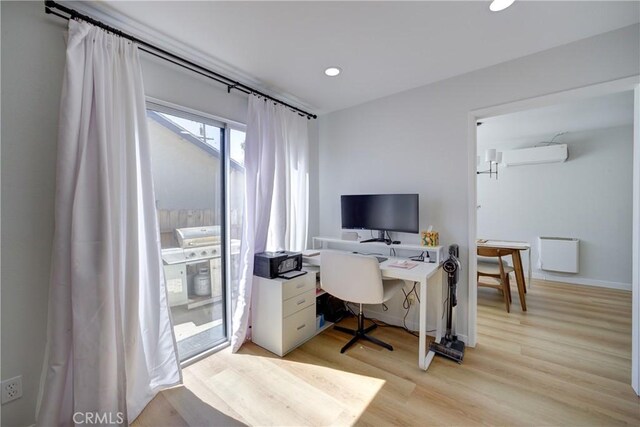 4210 Sirius Ave, Lompoc, CA 93436 - home office featuring baseboards, recessed lighting, light wood-style floors, and a wall unit AC