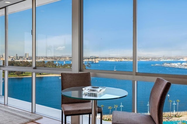 sunroom with a water view