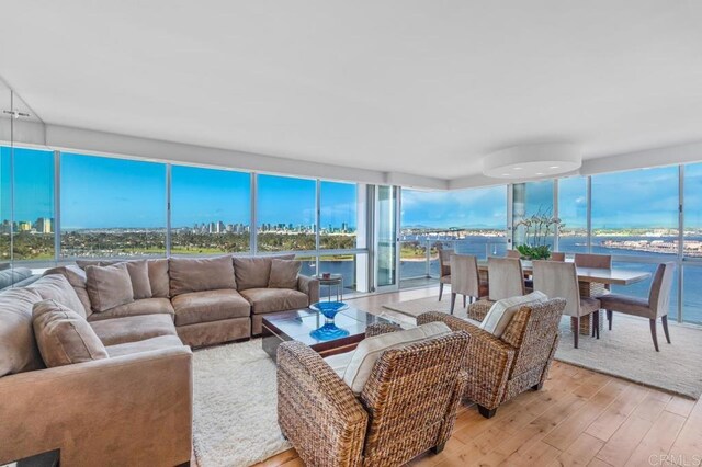 living area with hardwood / wood-style floors
