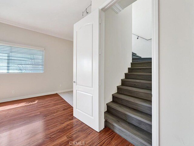 8309 Hillside Rd, Alta Loma, CA 91701 - stairway featuring wood finished floors and baseboards