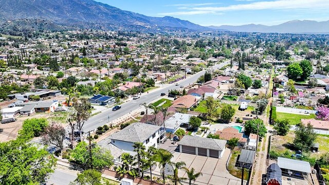 8309 Hillside Rd, Alta Loma, CA 91701 - aerial view of residential area with a mountain backdrop