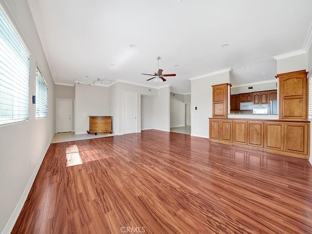 8309 Hillside Rd, Alta Loma, CA 91701 - unfurnished living room featuring light wood finished floors, a ceiling fan, crown molding, baseboards, and recessed lighting