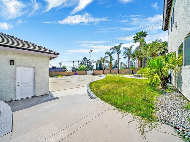 8309 Hillside Rd, Alta Loma, CA 91701 - view of yard with a patio and fence