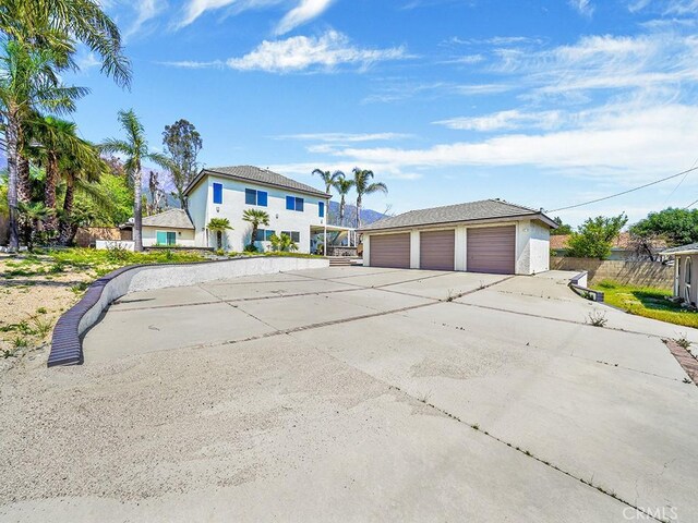 8309 Hillside Rd, Alta Loma, CA 91701 - traditional-style home featuring a garage and fence