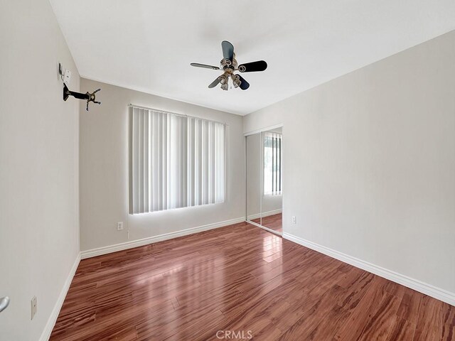 8309 Hillside Rd, Alta Loma, CA 91701 - spare room featuring ceiling fan, baseboards, and wood finished floors