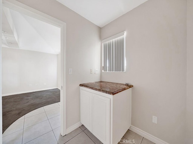 8309 Hillside Rd, Alta Loma, CA 91701 - interior space featuring light tile patterned flooring and baseboards