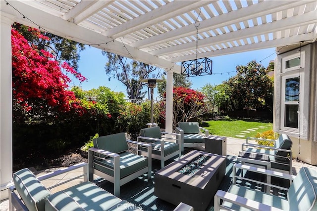 26962 Willow Tree Ln, Laguna Hills, CA 92653 - view of patio featuring a fenced backyard, a pergola, and an outdoor living space with a fire pit