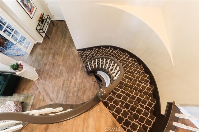26962 Willow Tree Ln, Laguna Hills, CA 92653 - staircase featuring wood finished floors