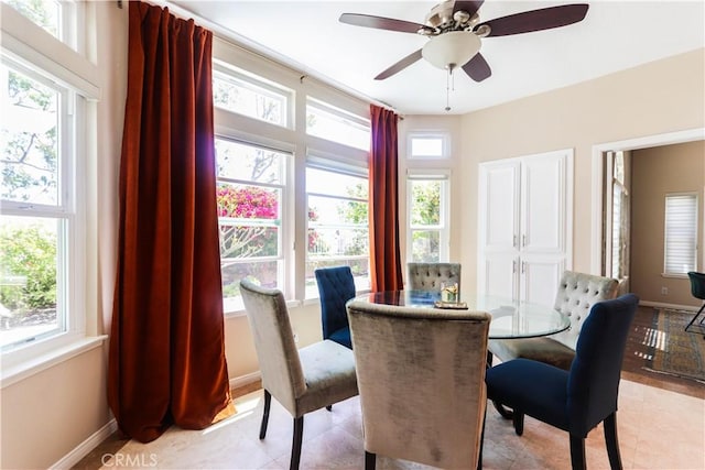 26962 Willow Tree Ln, Laguna Hills, CA 92653 - dining room featuring baseboards, a ceiling fan, and light tile patterned flooring
