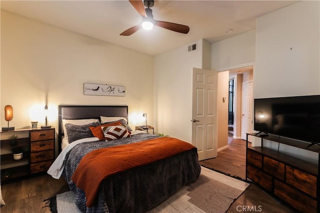 26962 Willow Tree Ln, Laguna Hills, CA 92653 - bedroom featuring baseboards, wood finished floors, visible vents, and a ceiling fan