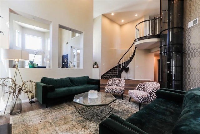 26962 Willow Tree Ln, Laguna Hills, CA 92653 - living area with baseboards, wood finished floors, and stairs
