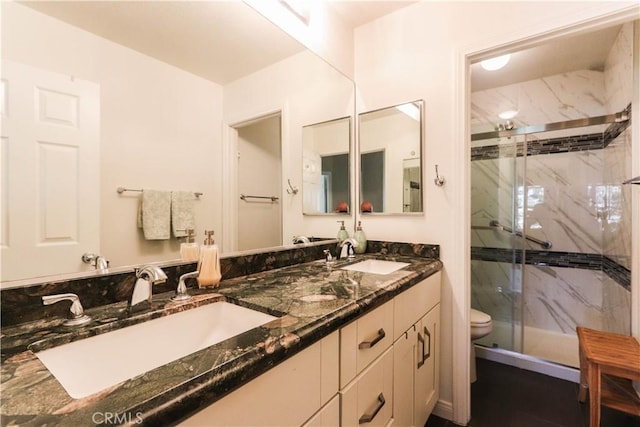 26962 Willow Tree Ln, Laguna Hills, CA 92653 - full bathroom featuring a marble finish shower, a sink, and toilet