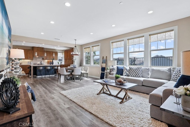 7 Alienta Ln, Rancho Mission Viejo, CA 92694 - living room featuring recessed lighting, baseboards, and light wood-style floors