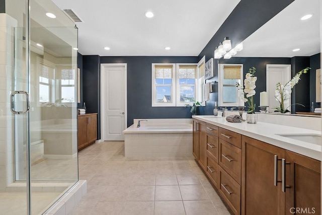 7 Alienta Ln, Rancho Mission Viejo, CA 92694 - full bath with double vanity, a garden tub, visible vents, a stall shower, and recessed lighting