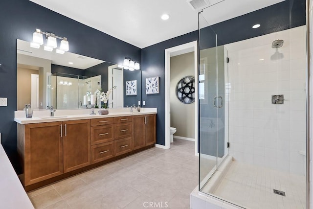 7 Alienta Ln, Rancho Mission Viejo, CA 92694 - full bathroom featuring a sink, tile patterned floors, a stall shower, and toilet