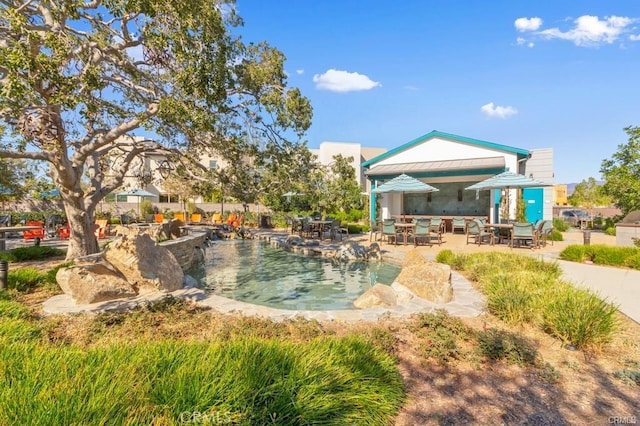 7 Alienta Ln, Rancho Mission Viejo, CA 92694 - outdoor pool featuring outdoor dining area and a patio area