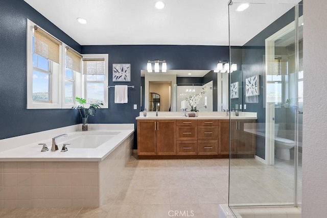7 Alienta Ln, Rancho Mission Viejo, CA 92694 - bathroom with double vanity, a garden tub, tile patterned flooring, a shower stall, and a sink