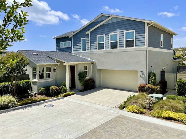 7 Alienta Ln, Rancho Mission Viejo, CA 92694 - traditional home featuring an attached garage, concrete driveway, and stucco siding