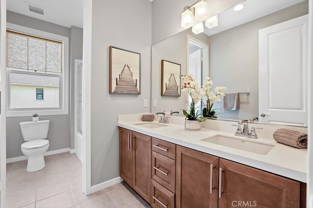 7 Alienta Ln, Rancho Mission Viejo, CA 92694 - bathroom featuring double vanity, baseboards, visible vents, and a sink