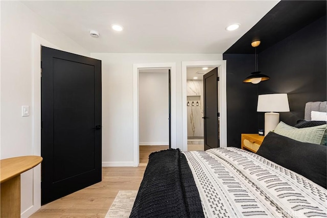 bedroom featuring light wood-style flooring, recessed lighting, and baseboards