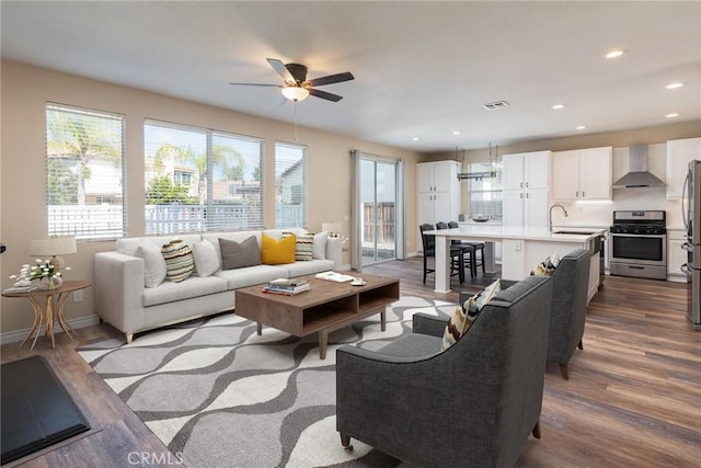 32460 Perigord Rd, Winchester, CA 92596 - living area with ceiling fan, dark wood-style floors, and recessed lighting