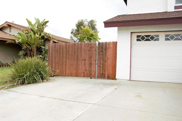 garage featuring fence
