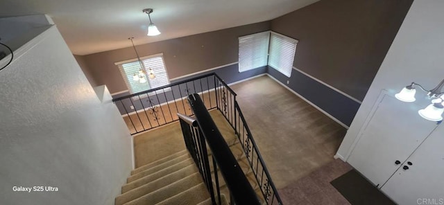 1258 Armstrong Cir, Escondido, CA 92027 - staircase with a chandelier, carpet floors, and baseboards