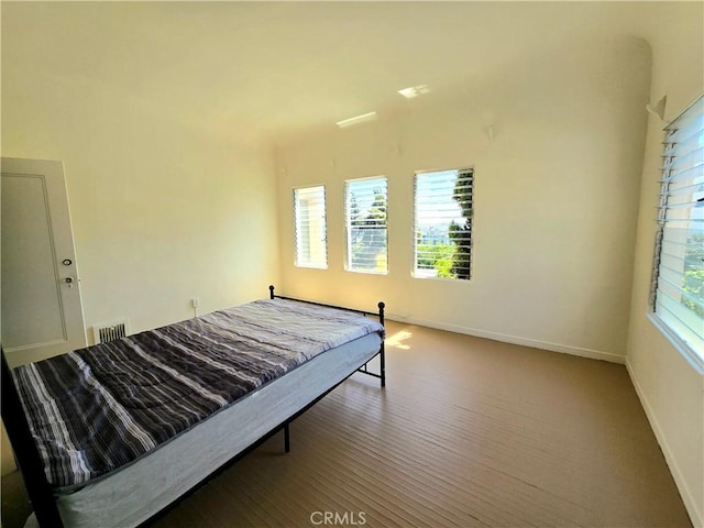 bedroom featuring baseboards