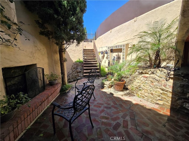 view of patio / terrace with stairs