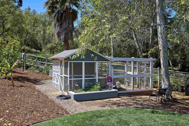 18320 Colina Fuerte, Rancho Santa Fe, CA 92067 - view of outdoor structure featuring fence and an outdoor structure
