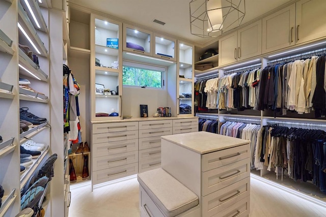18320 Colina Fuerte, Rancho Santa Fe, CA 92067 - walk in closet with a chandelier