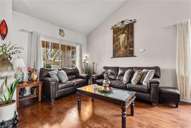 13126 Glandt Ct, Corona, CA 92883 - living area featuring wood finished floors and high vaulted ceiling