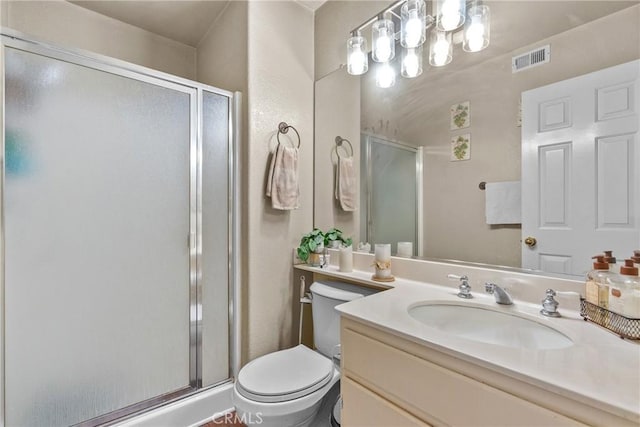 13126 Glandt Ct, Corona, CA 92883 - bathroom featuring visible vents, toilet, a shower stall, and vanity