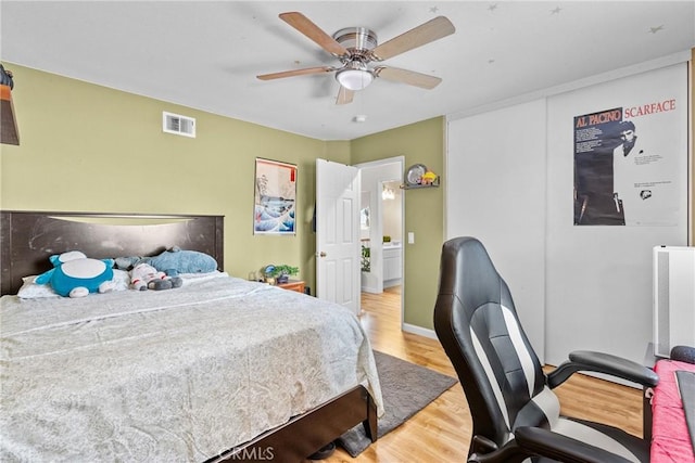 13126 Glandt Ct, Corona, CA 92883 - bedroom featuring visible vents, ceiling fan, and wood finished floors