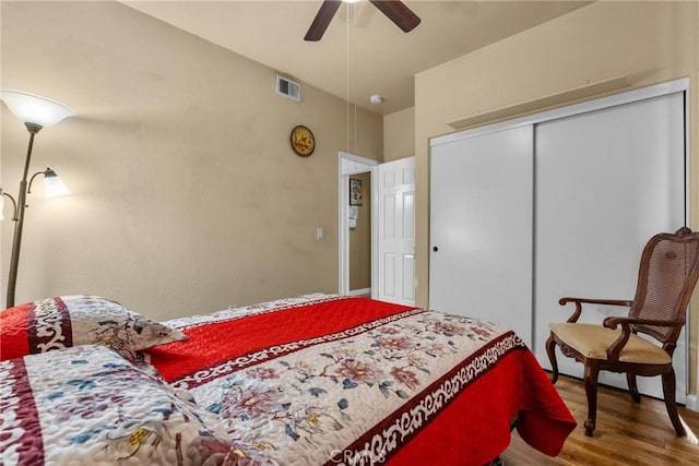 13126 Glandt Ct, Corona, CA 92883 - bedroom featuring visible vents, a closet, a ceiling fan, and wood finished floors