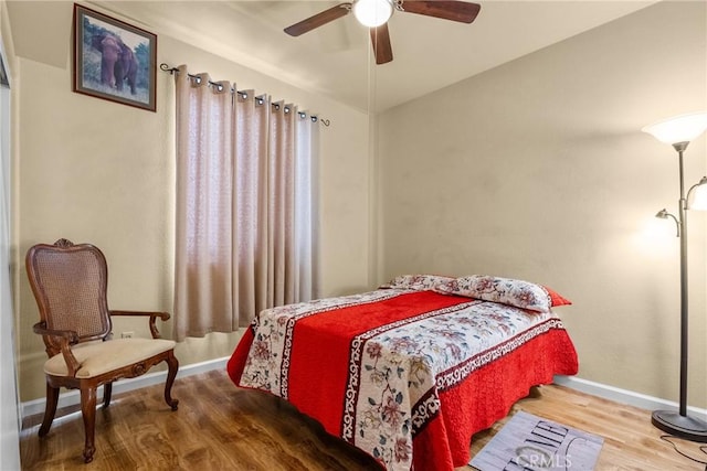 13126 Glandt Ct, Corona, CA 92883 - bedroom featuring ceiling fan, baseboards, and wood finished floors