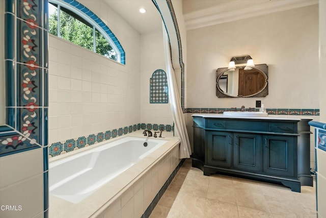 561 Saddle Ln, Ojai, CA 93023 - full bath with recessed lighting, tiled bath, ornamental molding, tile patterned floors, and vanity