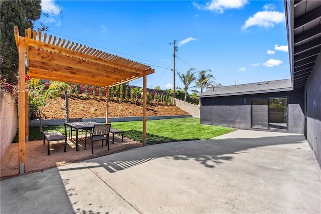 view of patio / terrace featuring fence