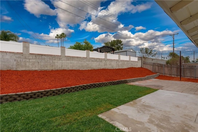8672 La Grande St, Rancho Cucamonga, CA 91701 - view of yard featuring a patio area and a fenced backyard
