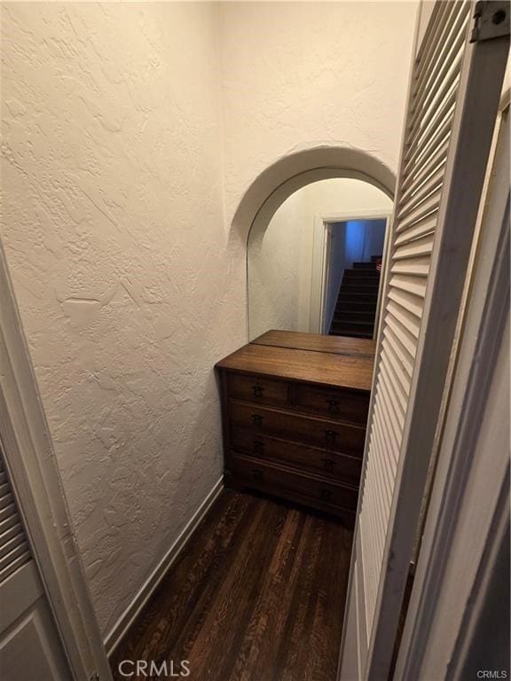 1958 Glencoe Way, Los Angeles, CA 90068 - room details featuring wood finished floors, baseboards, and a textured wall