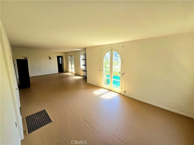 1958 Glencoe Way, Los Angeles, CA 90068 - empty room featuring wood finished floors, visible vents, and baseboards