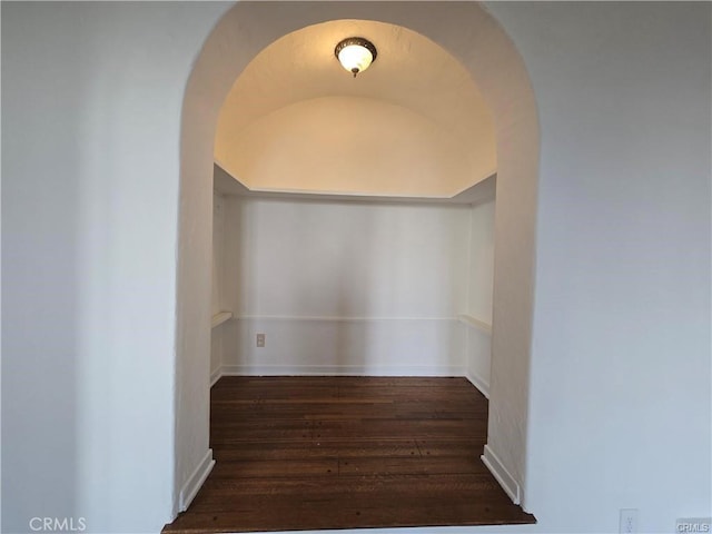 1958 Glencoe Way, Los Angeles, CA 90068 - hallway featuring arched walkways, wood finished floors, and baseboards