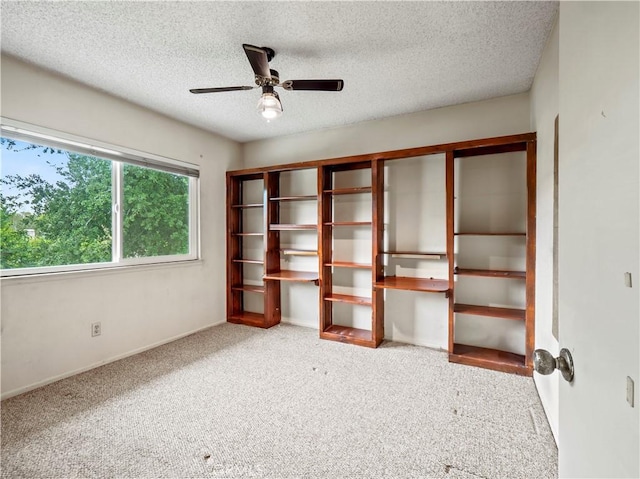 25582 Old Course Way, Valencia, CA 91355 - carpeted spare room featuring a ceiling fan, a textured ceiling, and baseboards