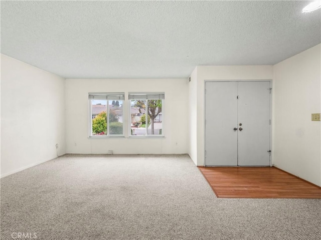25582 Old Course Way, Valencia, CA 91355 - unfurnished room featuring carpet floors and a textured ceiling