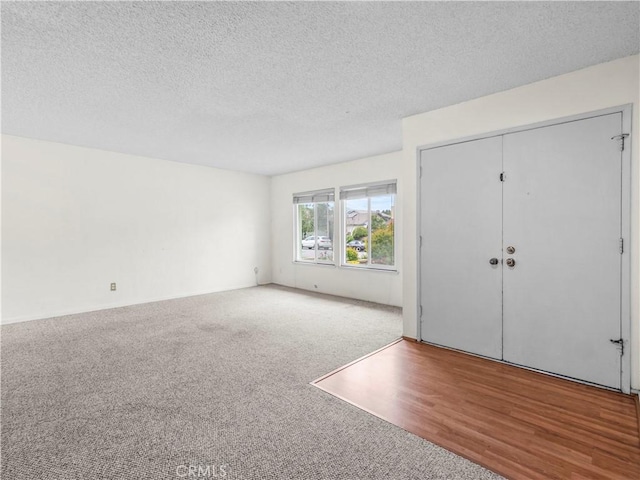25582 Old Course Way, Valencia, CA 91355 - carpeted foyer entrance featuring a textured ceiling